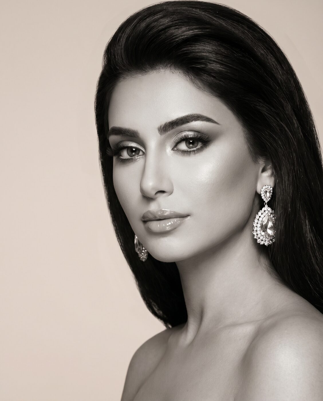 Editorial soft glam portrait, statement earrings